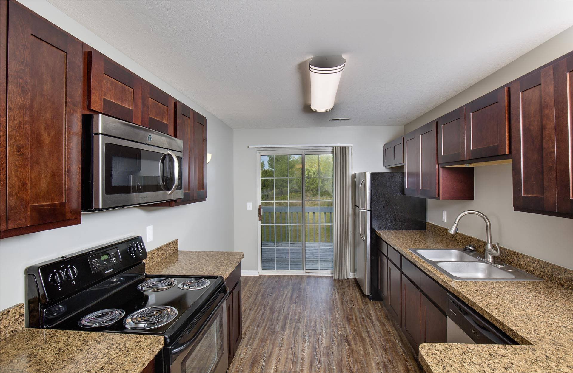 Central Park Apartments & Townhomes in Okemos, 1 of 8