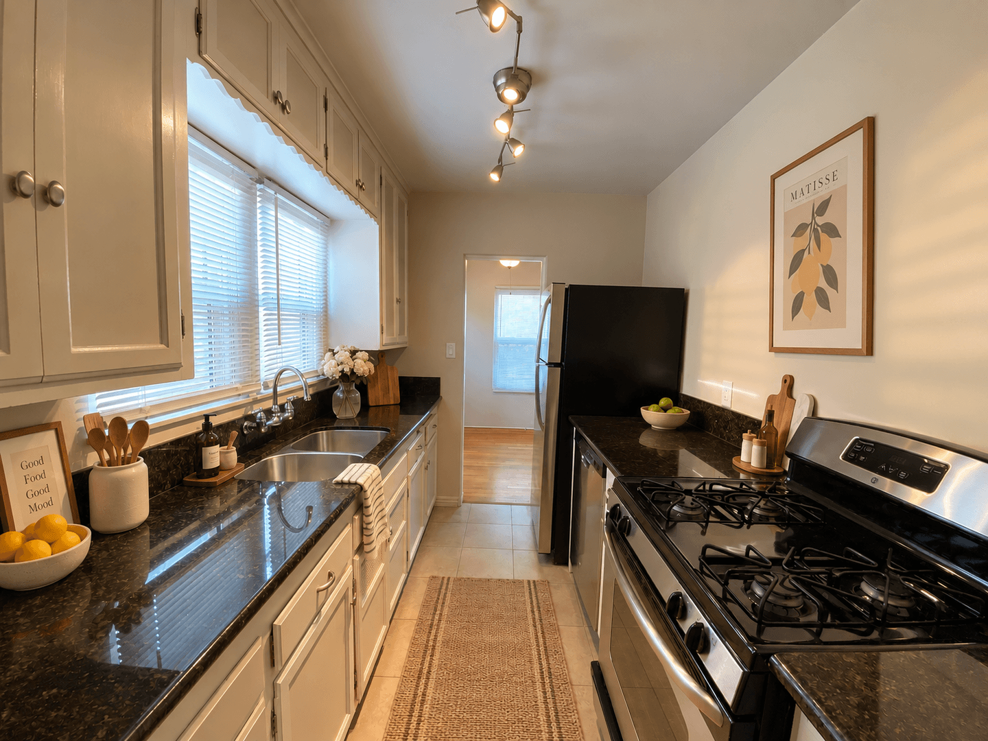 LARGE EXCLUSIVE PATIO! Charming Bungalow with In Unit Washer and Dryer! Air Conditioning + Garage 2 of 8