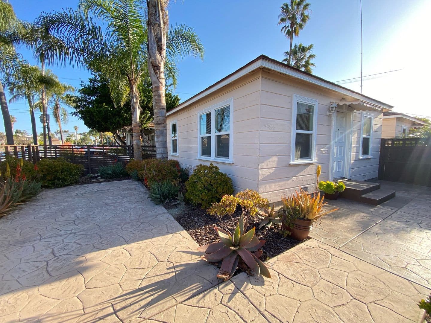LARGE EXCLUSIVE PATIO! Charming Bungalow with In Unit Washer and Dryer! Air Conditioning + Garage! 24 of 26