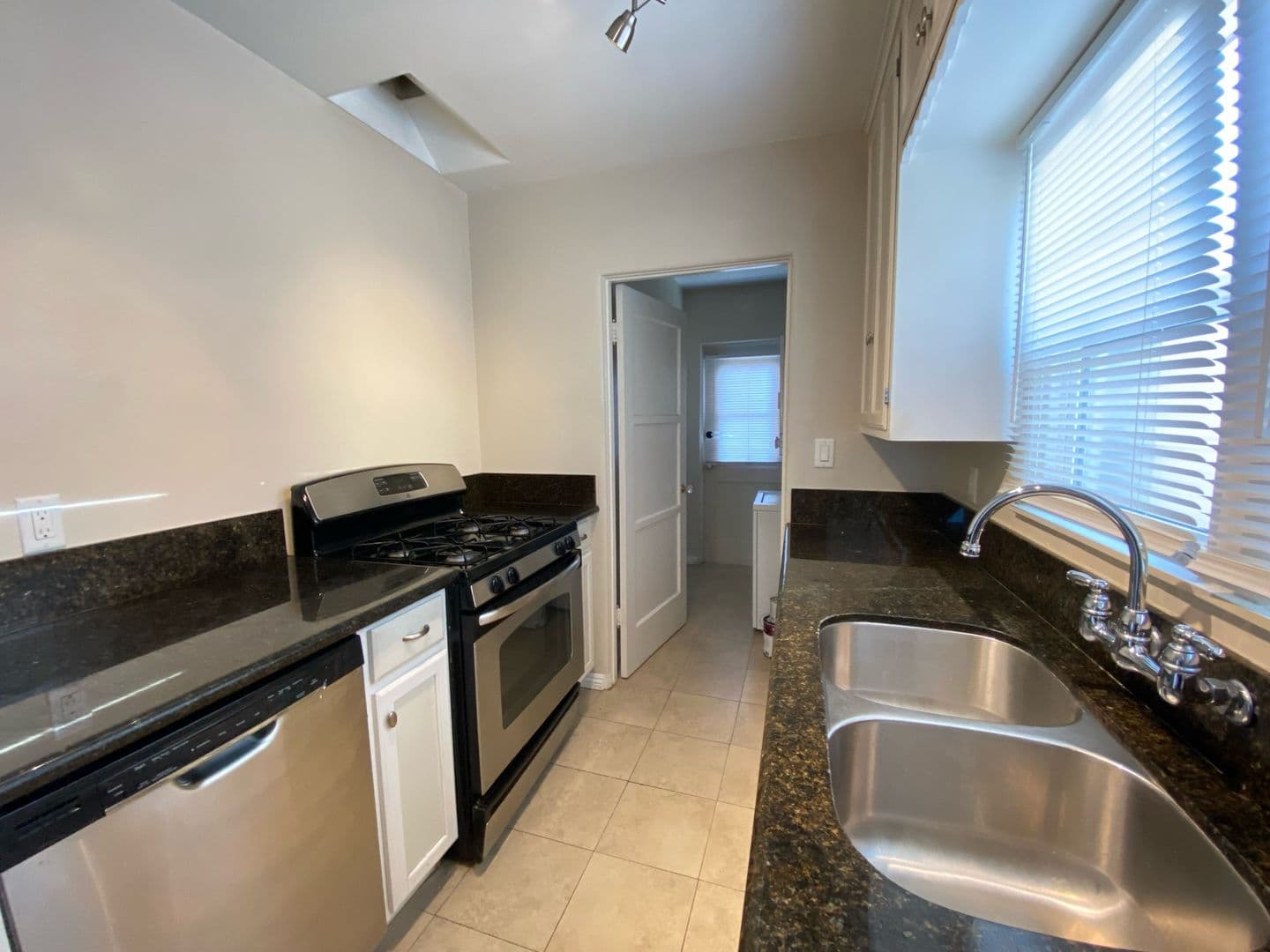 LARGE EXCLUSIVE PATIO! Charming Bungalow with In Unit Washer and Dryer! Air Conditioning + Garage! 16 of 26