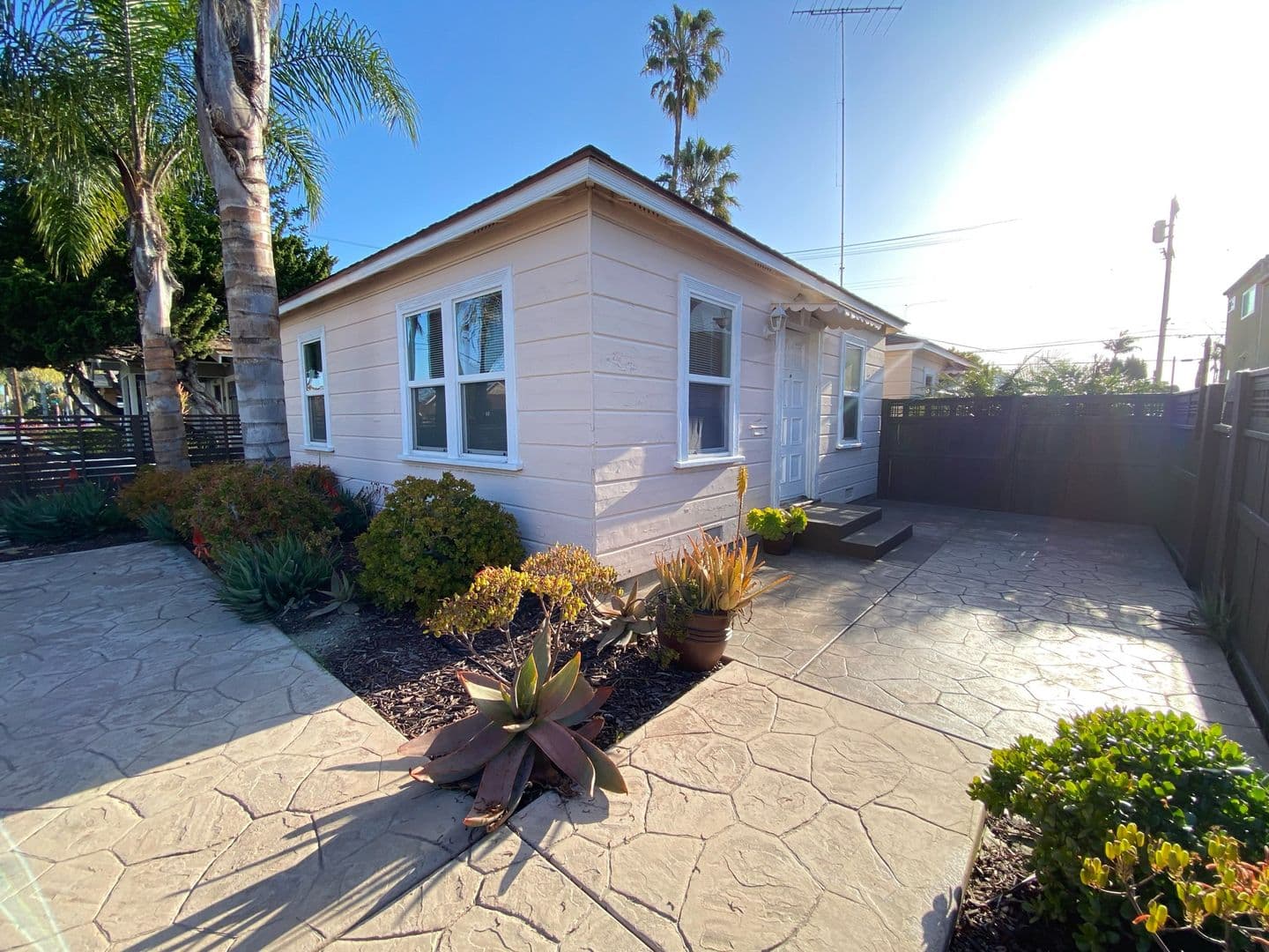 LARGE EXCLUSIVE PATIO! Charming Bungalow with In Unit Washer and Dryer! Air Conditioning + Garage! 18 of 26