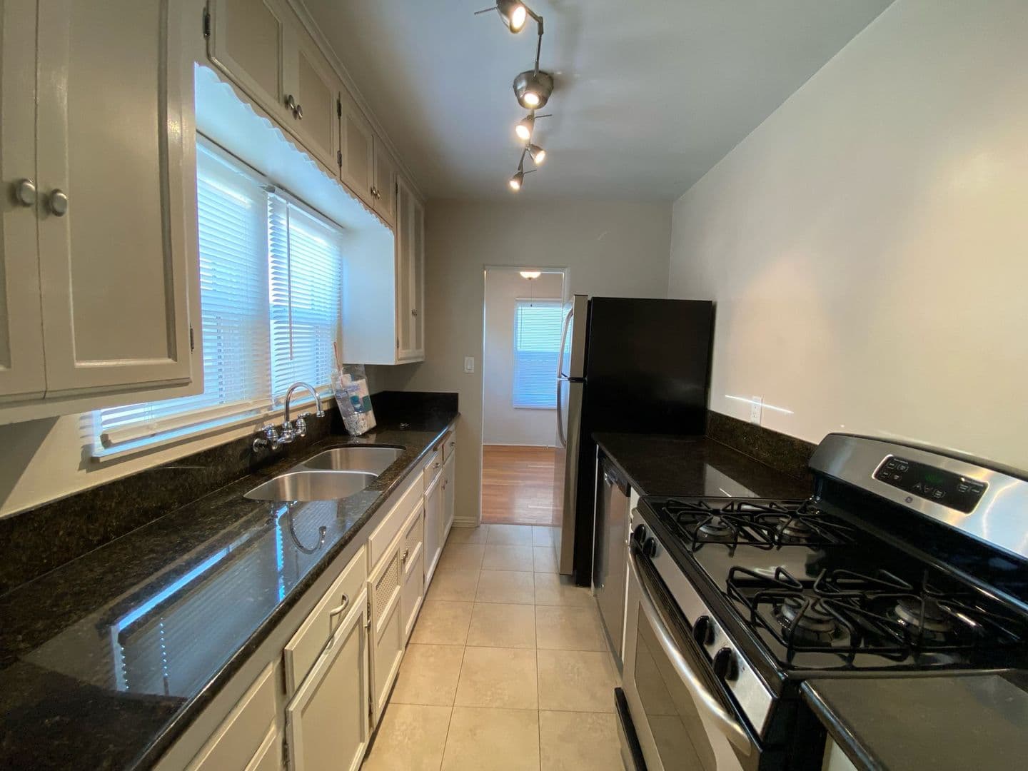 LARGE EXCLUSIVE PATIO! Charming Bungalow with In Unit Washer and Dryer! Air Conditioning + Garage! 17 of 26