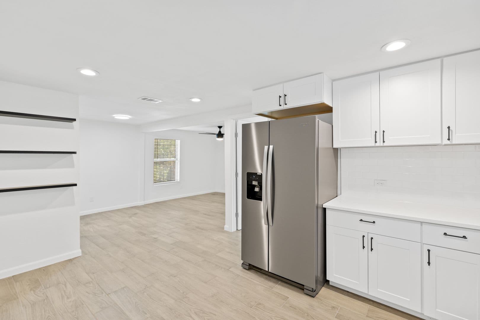 Updated 3 Bed / 2 Bath Two-Level Home with Granite Counters and Fenced Yard in 4 of 16