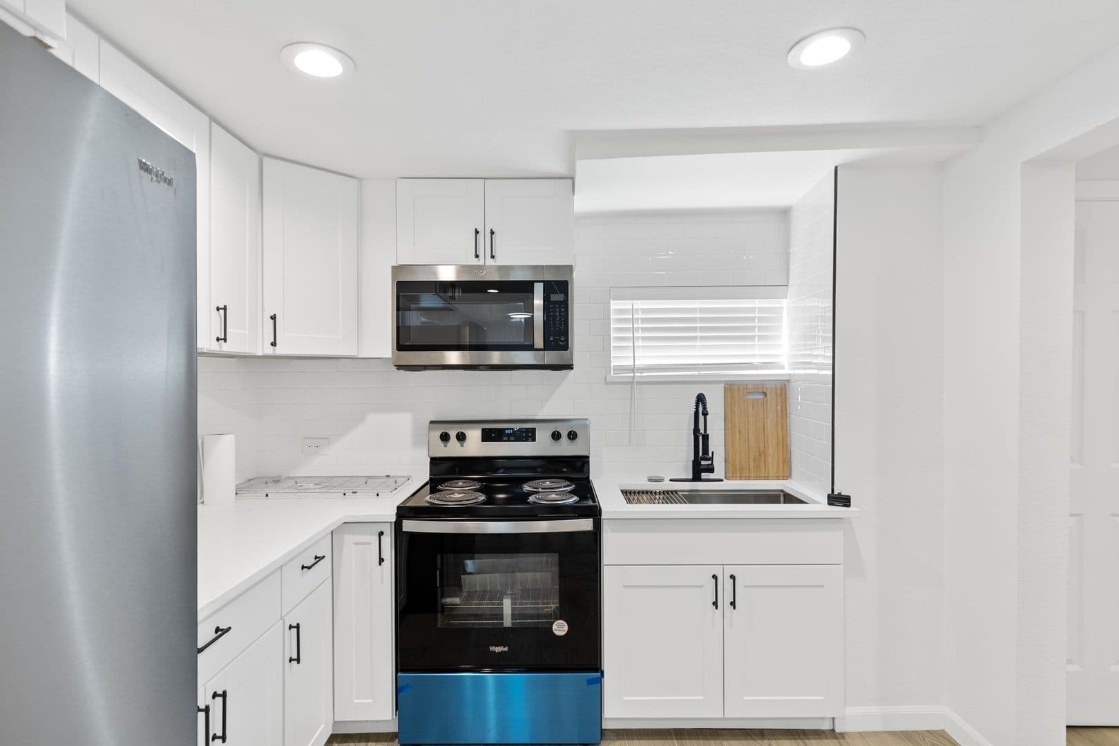 Updated 3 Bed / 2 Bath Two-Level Home with Granite Counters and Fenced Yard in 6 of 16