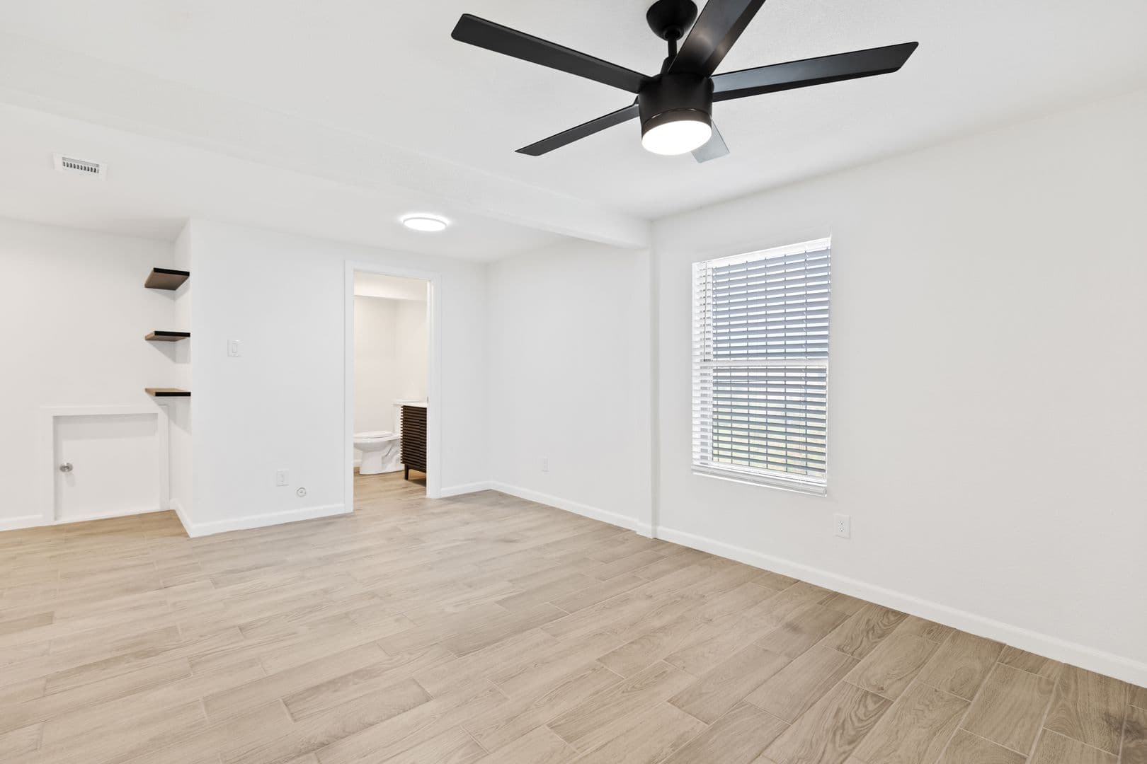 Updated 3 Bed / 2 Bath Two-Level Home with Granite Counters and Fenced Yard in Dallas 9 of 24