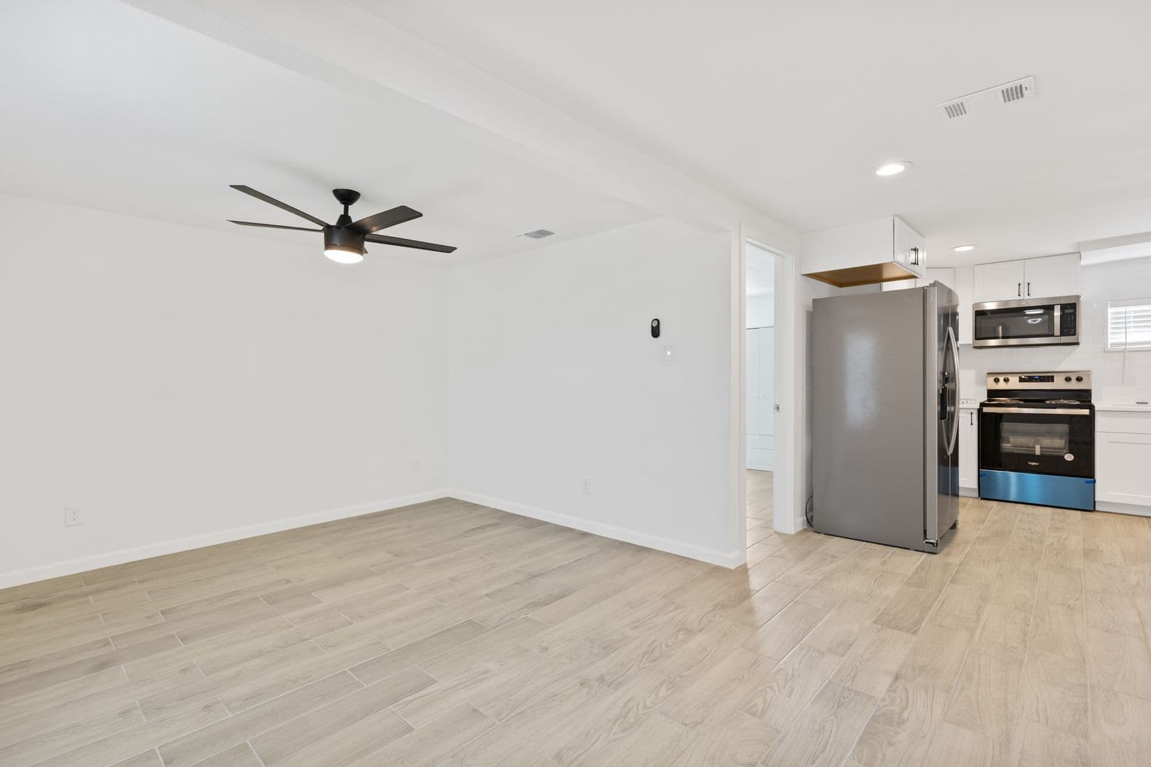 Updated 3 Bed / 2 Bath Two-Level Home with Granite Counters and Fenced Yard in 7 of 16
