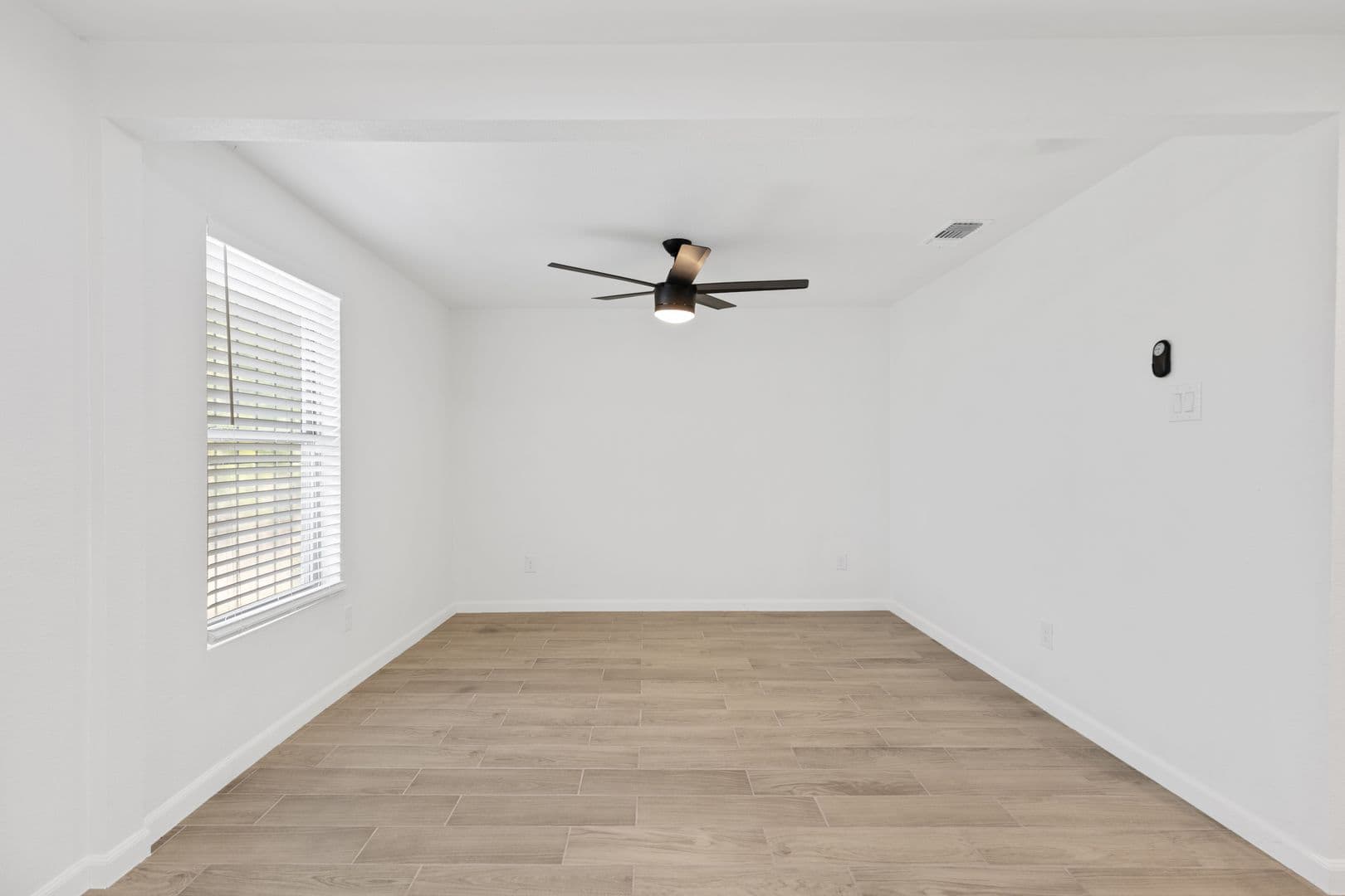 Updated 3 Bed / 2 Bath Two-Level Home with Granite Counters and Fenced Yard in 8 of 16