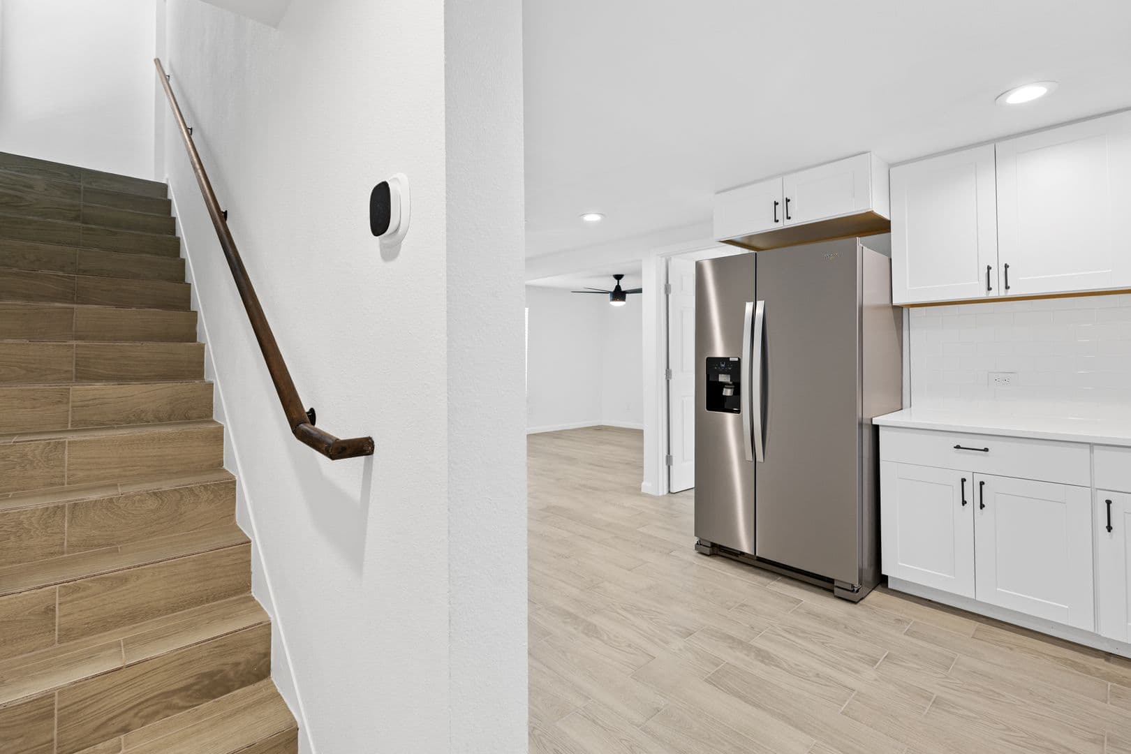 Updated 3 Bed / 2 Bath Two-Level Home with Granite Counters and Fenced Yard in 3 of 16