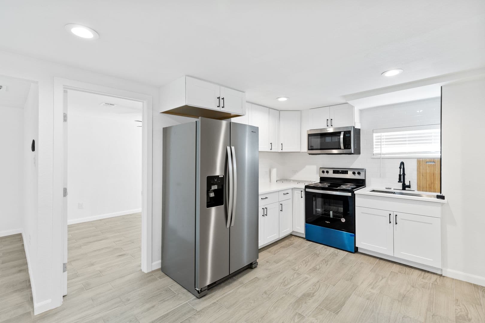 Updated 3 Bed / 2 Bath Two-Level Home with Granite Counters and Fenced Yard in 5 of 16