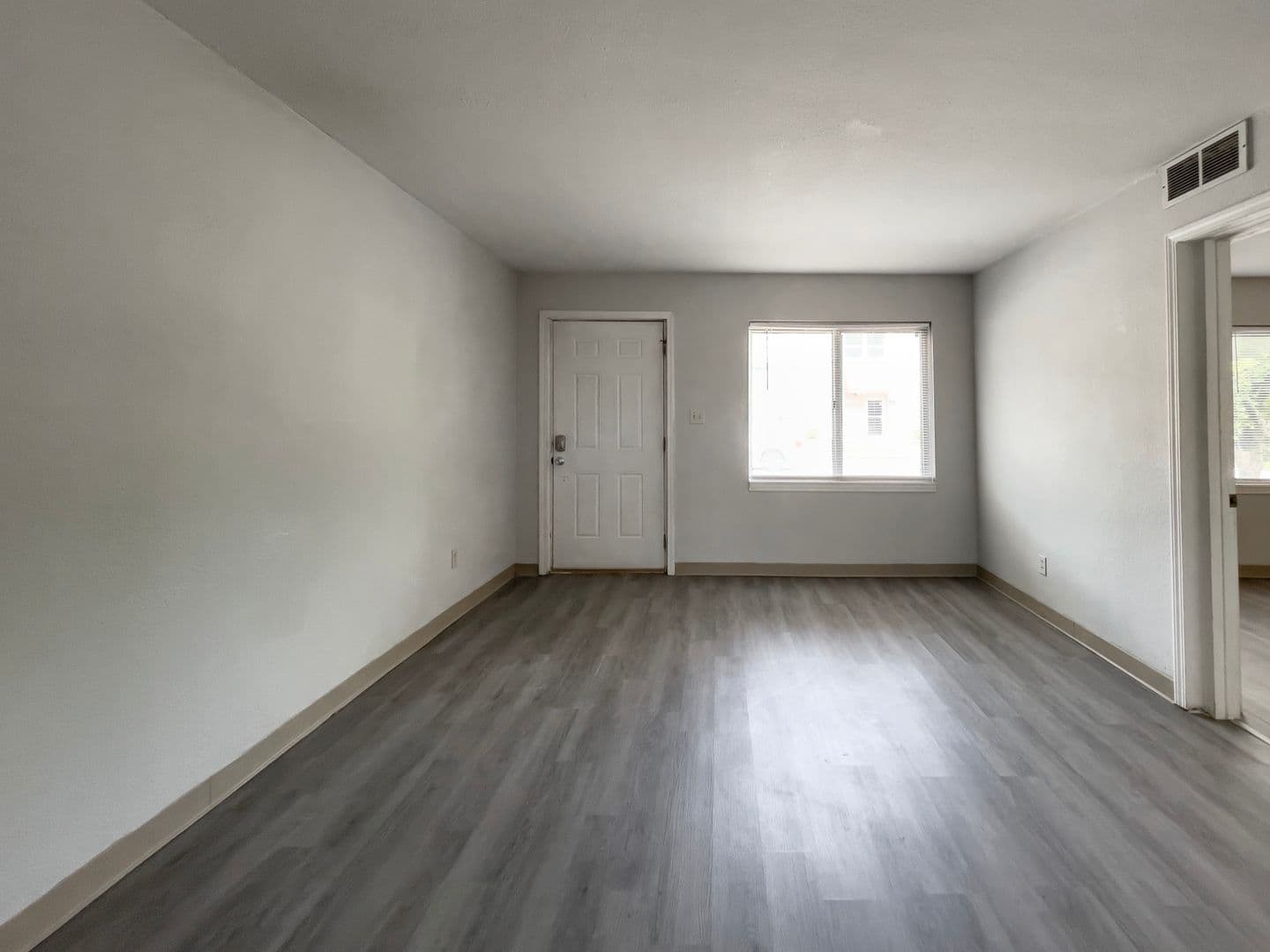 District on Gilbert, close to Campus, updated flooring. 8 of 13