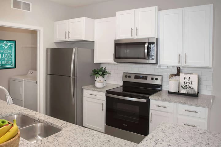 Cascade Shores Townhomes + Flats 1 of 12